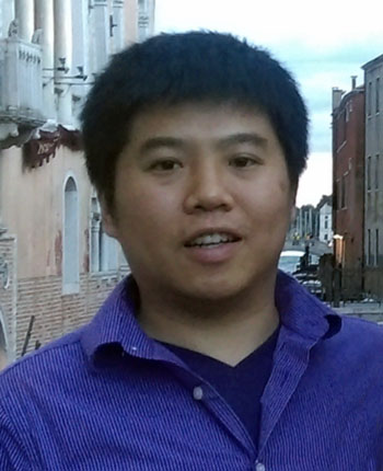 Headshot of Richard Wang who is wearing a blue shirt.